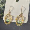 Gold Wire Kite Peridot Earrings Gold Wire Kite Peridot Earrings — handcrafted wire-wrapped gemstone jewelry, photo 3