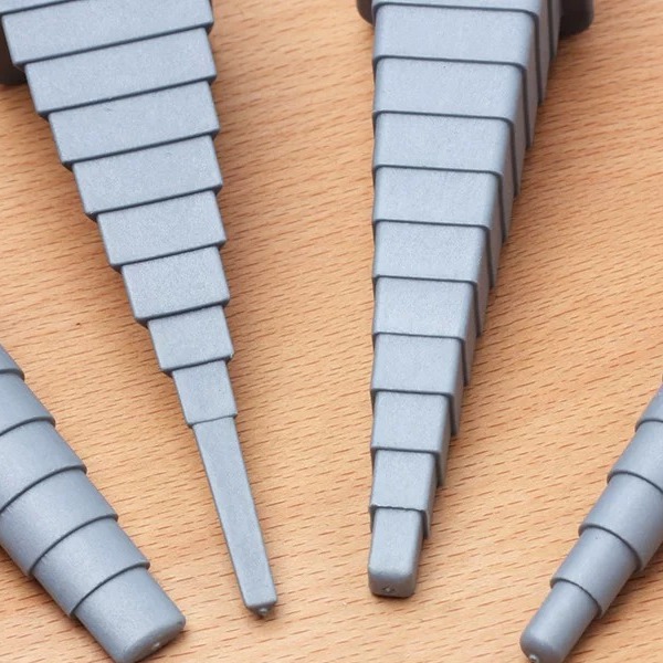 wire-mandrel-set-wood Stepped wire wrapping mandrels close-up on a wooden work surface